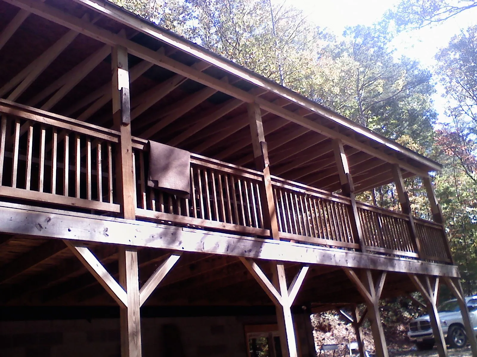 Timber framing under a new elevated porch and deck — Roof Leak Repair in Hosford by Roofing Brothers